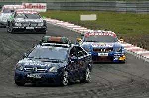 Images Dated 25th May 2003: Mattias Ekstrom (SWE), Red Bull Abt Audi TT-R, behind the safety car during the early stages of