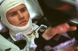 Images Dated 27th March 2000: McLaren-David Coulthard watches monitor-Portrait