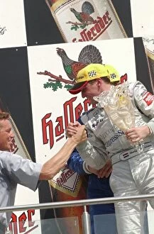 Images Dated 11th May 2003: Podium, Hans-Jurgen Mattheis (GER), Team Manager HWA, congratulates Christijan Albers (NED)
