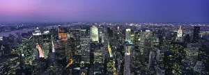 Aerial View Of Midtown Manhattan Illuminated At Dusk Aerial View Of Midtown Manhattan Illuminated At Dusk