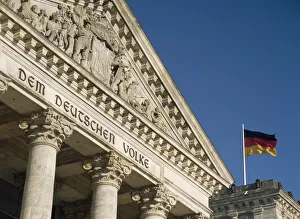 Detail Of Bundestag (Reichstag) With German Flag In Front Detail Of Bundestag (Reichstag) With German Flag In Front