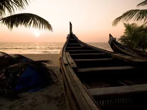 Two Canoes On The Beach At The Arabian Sea, Kerala, India Two Canoes On The Beach At The Arabian Sea, Kerala, India