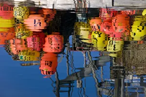 Commercial Fishing Boat Buoys And Gear Reflect In The Waters For King Crab Fishing On The Stern Of The Vessel Commercial Fishing Boat Buoys And Gear Reflect In The Waters For King Crab Fishing On The Stern Of The Vessel