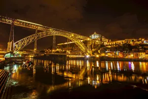 Dom Luis I Bridge crossing River Douro with Vila Nova de Gaia lit up at night, Porto, Portugal Dom Luis I Bridge crossing River Douro with Vila Nova de Gaia lit up at night, Porto, Portugal
