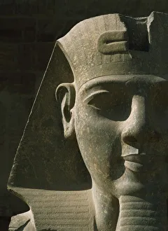 Egypt, Detail of pharaoh head at entrance to Luxor Temple; Luxor Egypt, Detail of pharaoh head at entrance to Luxor Temple; Luxor