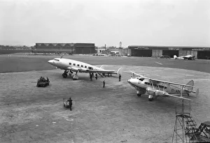 Fortuna at Croydon aerodrome with DH86 of Aer Lingus; Croydon, England Fortuna at Croydon aerodrome with DH86 of Aer Lingus; Croydon, England