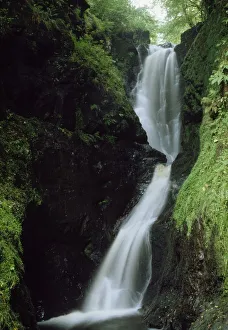 Glenariff Falls, Glens Of Antrim, Co Antrim, Ireland; Flowing Waterfall Glenariff Falls, Glens Of Antrim, Co Antrim, Ireland; Flowing Waterfall
