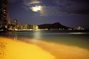 Hawaii, Oahu, Diamond Head At Night, Moon Hidden Behind Clouds, Bright Yellow Sand Hawaii, Oahu, Diamond Head At Night, Moon Hidden Behind Clouds, Bright Yellow Sand