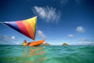 Hawaii, Oahu, Lanikai, Man In Colorful Sailing Canoe Hawaii, Oahu, Lanikai, Man In Colorful Sailing Canoe