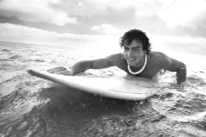 Hawaii, Oahu, Young Man Paddling On His Surfboard In The Water Hawaii, Oahu, Young Man Paddling On His Surfboard In The Water