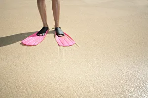 Hawaii, Woman Wearing Pink Snorkel Flippers On Sandy Beach Hawaii, Woman Wearing Pink Snorkel Flippers On Sandy Beach