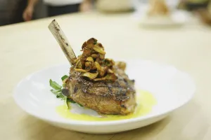 Lamb chop on a plate in a restaurant; boston massachusetts usa Lamb chop on a plate in a restaurant; boston massachusetts usa