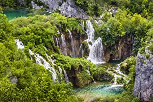 The large waterfall and lush vegetation at Plitvice Lakes National Park in Lika-Senj county in Croatia The large waterfall and lush vegetation at Plitvice Lakes National Park in Lika-Senj county in Croatia