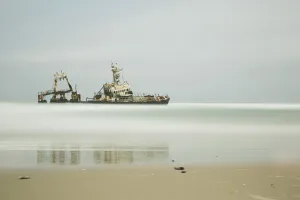 Long Exposure Of An Unnamed Shipwreck Along The Skeleton Coast; Namibia Long Exposure Of An Unnamed Shipwreck Along The Skeleton Coast; Namibia