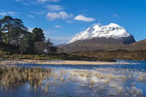 Looking across small lochen to Liathach covered in snow, Glen Torridon; Scotland, United Kingdom Looking across small lochen to Liathach covered in snow, Glen Torridon; Scotland, United Kingdom