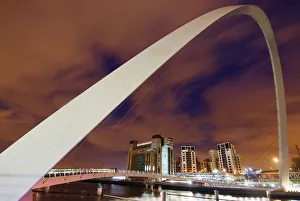 Looking Over The Tyne At Dusk Through The Winking Bridge To The Baltic Arts Centre Looking Over The Tyne At Dusk Through The Winking Bridge To The Baltic Arts Centre