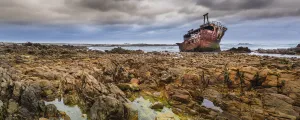 Meisho Maru No. 38 shipwreck on the beach at Cape Agulhas in Agulhas National Park, South Africa Meisho Maru No. 38 shipwreck on the beach at Cape Agulhas in Agulhas National Park, South Africa