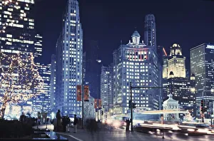Michigan Avenue Traffic At Night With Cityscape In Background Michigan Avenue Traffic At Night With Cityscape In Background