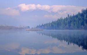 One Mile Lake, Near Pemberton, Bc In Early Morning Mist One Mile Lake, Near Pemberton, Bc In Early Morning Mist