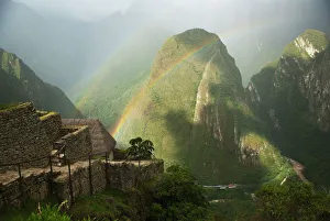 Mountain And Train Below Along Urubamba (Vilcanota) River, Machu Picchu, Peru Mountain And Train Below Along Urubamba (Vilcanota) River, Machu Picchu, Peru