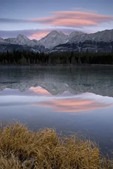 Partially Frozen Spillway Lake At Sunset; Kananaskis, Alberta, Canada Partially Frozen Spillway Lake At Sunset; Kananaskis, Alberta, Canada