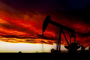 Pumpjack with dramatic chinook sky, Alberta, Canada Pumpjack with dramatic chinook sky, Alberta, Canada