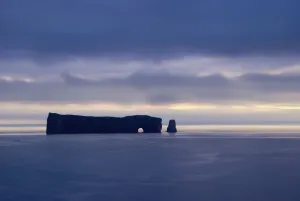 Rock Formation Perce Rock In The Water In Shades Of Blue; Perce,Quebec, Canada Rock Formation Perce Rock In The Water In Shades Of Blue; Perce,Quebec, Canada