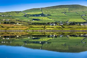 Scenic view of farmland and coast, Valentia Island, along the Skellig Coast on the Ring of Kerry, County Kerry, Ireland Scenic view of farmland and coast, Valentia Island, along the Skellig Coast on the Ring of Kerry, County Kerry, Ireland