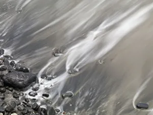 Shoreline; Water Lapping Up Against A Rocky Shoreline Shoreline; Water Lapping Up Against A Rocky Shoreline