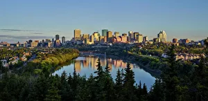 Skyline Of Downtown Edmonton Reflected In The North Saskatchewan River Under A Blue Sky; Edmonton, Alberta, Canada Skyline Of Downtown Edmonton Reflected In The North Saskatchewan River Under A Blue Sky; Edmonton, Alberta, Canada