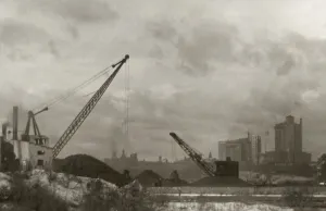 Steam diggers in the USA in front of skyscrapers in victorian times; United States of America Steam diggers in the USA in front of skyscrapers in victorian times; United States of America