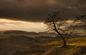 Storm clouds over a hilly landscape; Northumberland england Storm clouds over a hilly landscape; Northumberland england