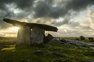 Sunrise at Poulnabrone dolmen stone in the Burren, County Clare, Ireland Sunrise at Poulnabrone dolmen stone in the Burren, County Clare, Ireland