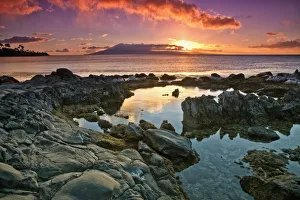 Sunset Reflected In The Tranquil Tide Pools Along The Coast; Hawaii, United States Sunset Reflected In The Tranquil Tide Pools Along The Coast; Hawaii, United States
