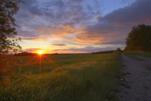 Sunset On The Rolling Hills Of The Prairies Of Alberta Sunset On The Rolling Hills Of The Prairies Of Alberta