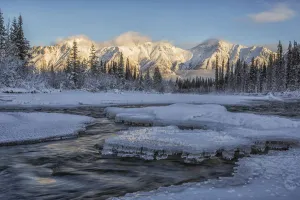 Sunset Over The Wheaton River As The Light Hits Grey Ridge, Near Whitehorse; Yukon Sunset Over The Wheaton River As The Light Hits Grey Ridge, Near Whitehorse; Yukon