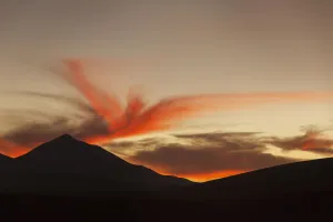 The Surreal Landscape Of Bolivia's Altiplano Region Near Uyuni Lights Up In A Beautiful Sunset; Bolivia The Surreal Landscape Of Bolivia's Altiplano Region Near Uyuni Lights Up In A Beautiful Sunset; Bolivia