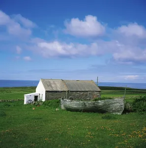 Tory Island, Co Donegal, Ireland, Cottage And Boat Tory Island, Co Donegal, Ireland, Cottage And Boat