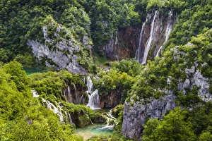 The tranquil, large waterfall at Plitvice Lakes National Park in Lika-Senj county in Croatia The tranquil, large waterfall at Plitvice Lakes National Park in Lika-Senj county in Croatia