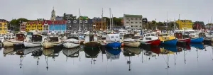 View of a colorful harbor in Torshavn's historic Tinganes District View of a colorful harbor in Torshavn's historic Tinganes District