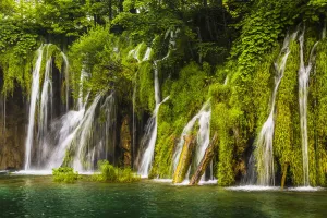 Waterfalls and lush vegetation at the Plitvice Lakes National Park, Croatia Waterfalls and lush vegetation at the Plitvice Lakes National Park, Croatia
