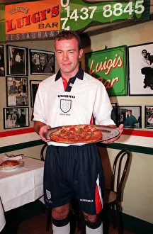 12 - ALAN SHEARER SHOWING OFF THE NEW 1997 ENGLAND KIT HOLDING A PIZZA 12 - ALAN SHEARER SHOWING OFF THE NEW 1997 ENGLAND KIT HOLDING A PIZZA