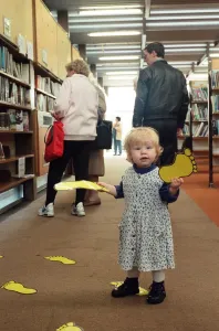 18-month-old Ellen Garbutt of Redcar sorts out the foot prints in Redcar Library 18-month-old Ellen Garbutt of Redcar sorts out the foot prints in Redcar Library