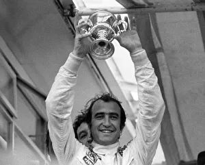 1971 Race of Champions at Brands Hatch. Winner Clay Regazzoni holds aloft 1971 Race of Champions at Brands Hatch. Winner Clay Regazzoni holds aloft