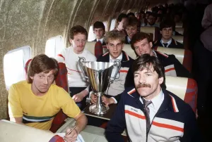 The Aberdeen team on their flight home from Gothenburg with the Europan Cup Winners Cup The Aberdeen team on their flight home from Gothenburg with the Europan Cup Winners Cup