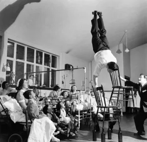 Acrobat Fred Edwards performing at a childrens hospital. May 1953 D2247 Acrobat Fred Edwards performing at a childrens hospital. May 1953 D2247