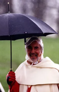Actor Christopher Lee well protected from the weather during filming of Ivanhoe for Actor Christopher Lee well protected from the weather during filming of Ivanhoe for