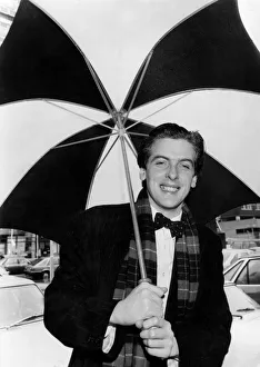 Actor Peter Capaldi holding an umbrella. March 1983 Actor Peter Capaldi holding an umbrella. March 1983