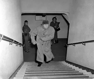 Actor Peter Sellers hurries upstairs of the Paris cinema in central London after his Actor Peter Sellers hurries upstairs of the Paris cinema in central London after his