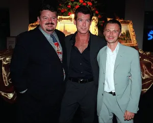 Actor Pierce Brosnan August 1999 with Robert Carlye and Robbie Cotrane at party after Actor Pierce Brosnan August 1999 with Robert Carlye and Robbie Cotrane at party after